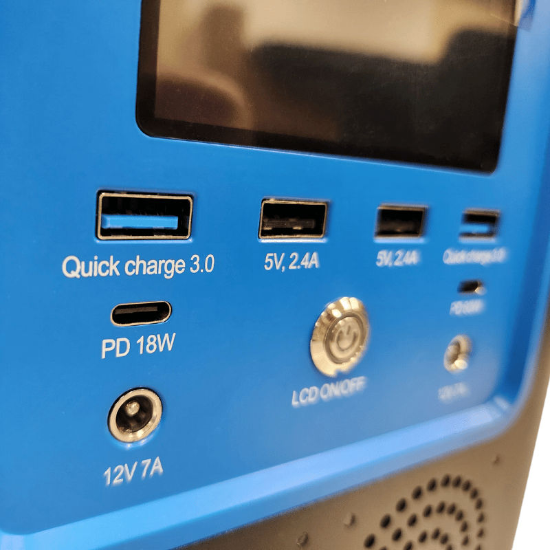 Close-up of the Hey Bata Minor League Pitching Machine Training Package panel, featuring USB, USB-C PD 18W, 12V 7A ports, and an "LCD ON/OFF" button—ideal for youth baseball training.